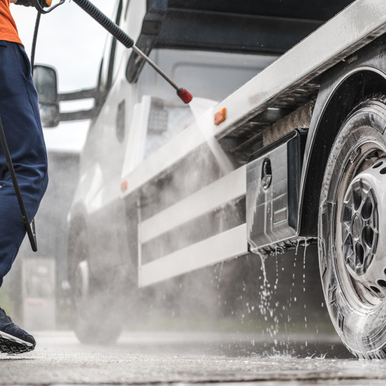 Pressure washing fleet vehicles 